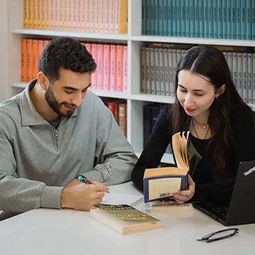 Two students studying in the Tbilisi library.